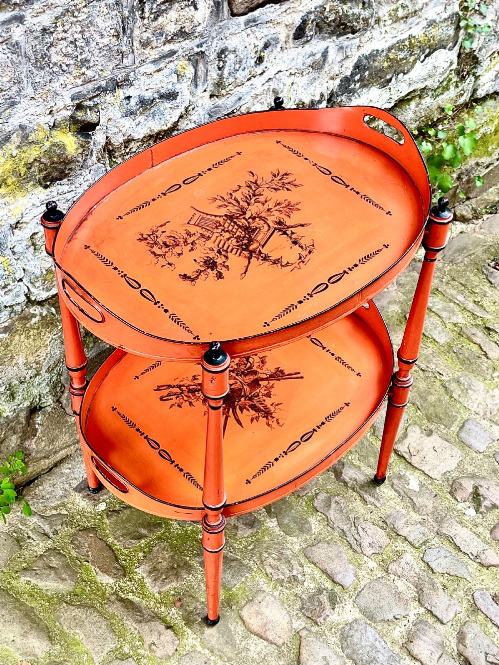 An early 20th century tole peinte two tier table View II
