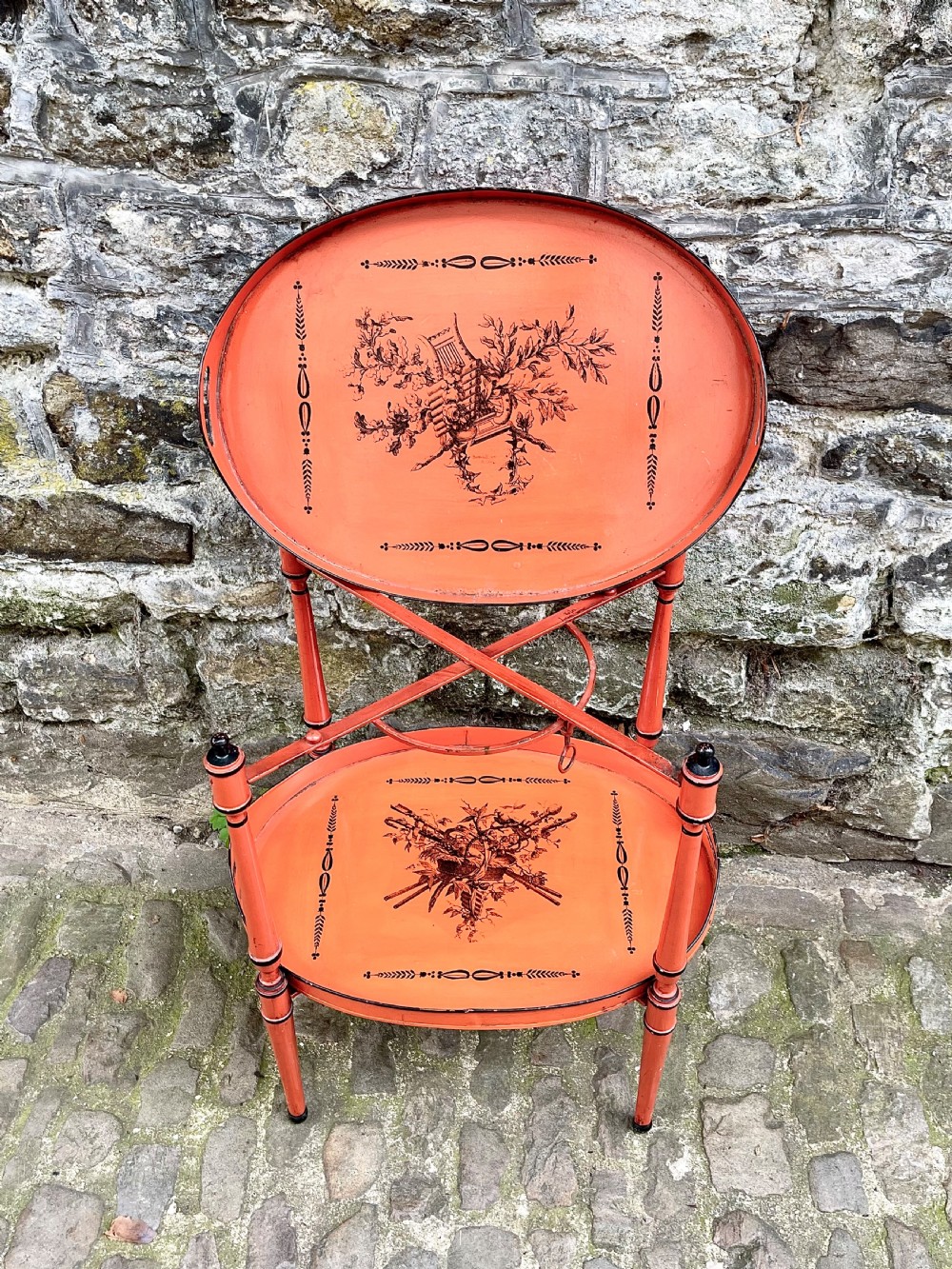 An early 20th century tole peinte two tier table View V