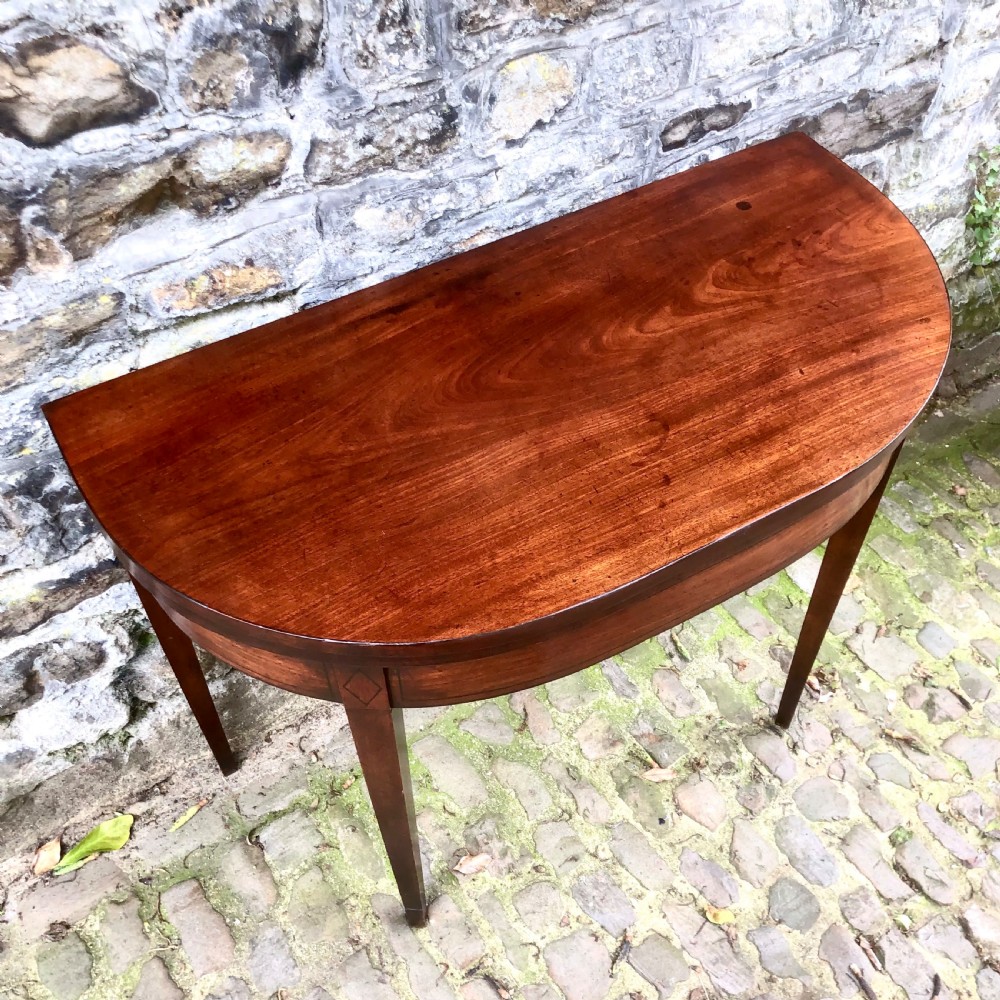 A George III mahogany card table View II