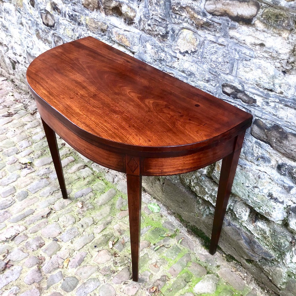 A George III mahogany card table View IV