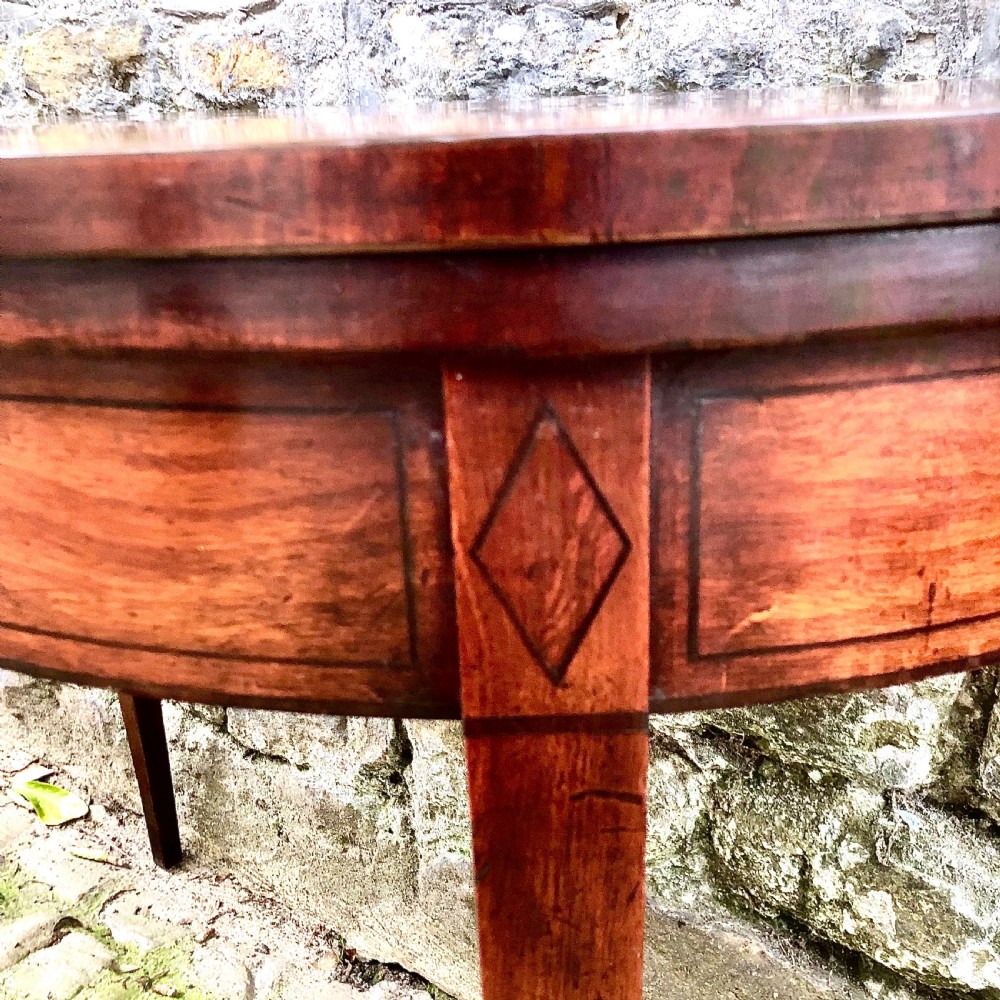 A George III mahogany card table View VI