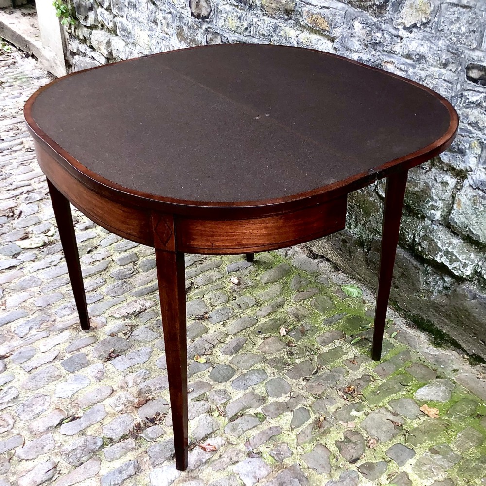 A George III mahogany card table View VII
