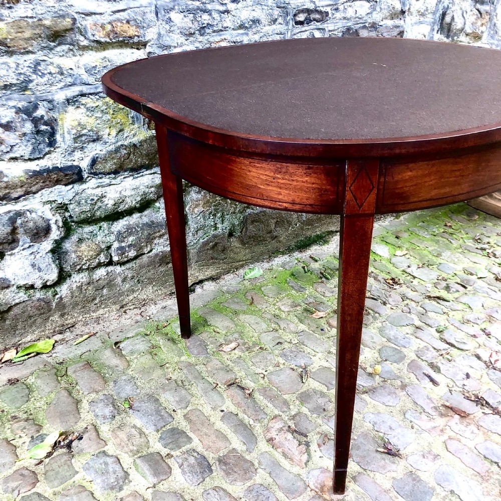 A George III mahogany card table View VIII