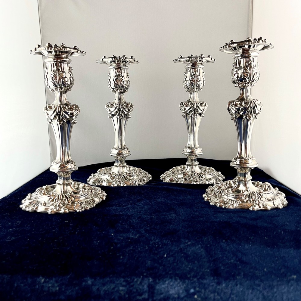A set of four Old Sheffield Plate candlesticks