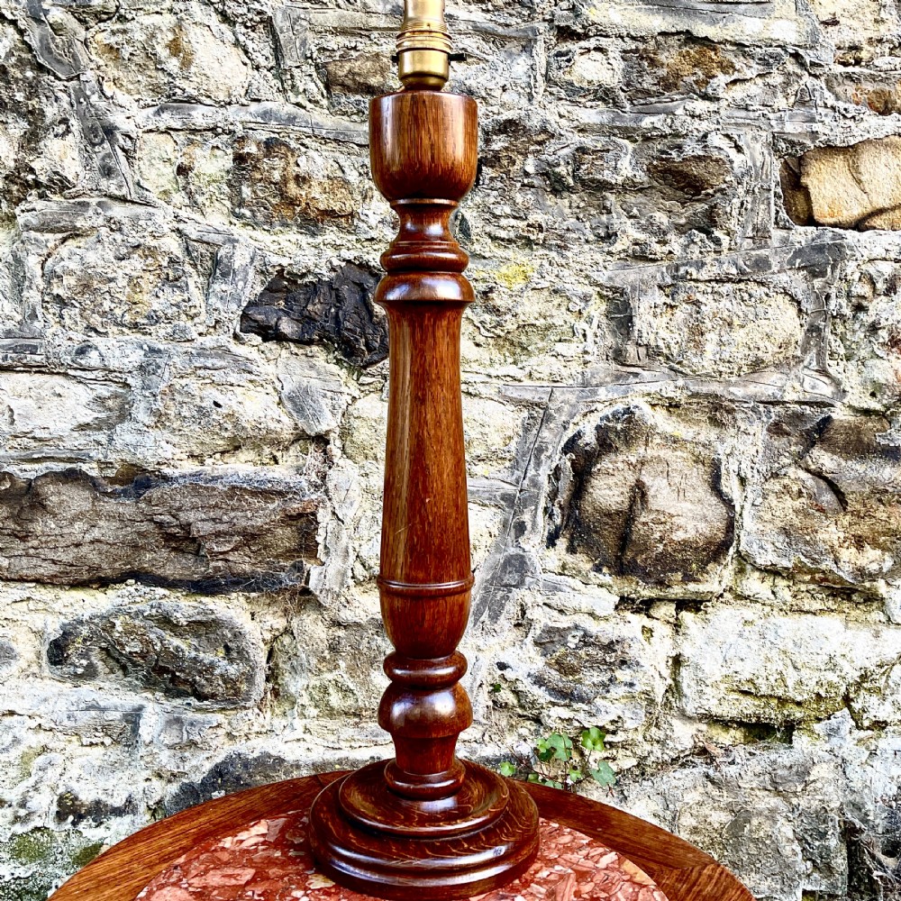 A pair of turned oak table lamps View II