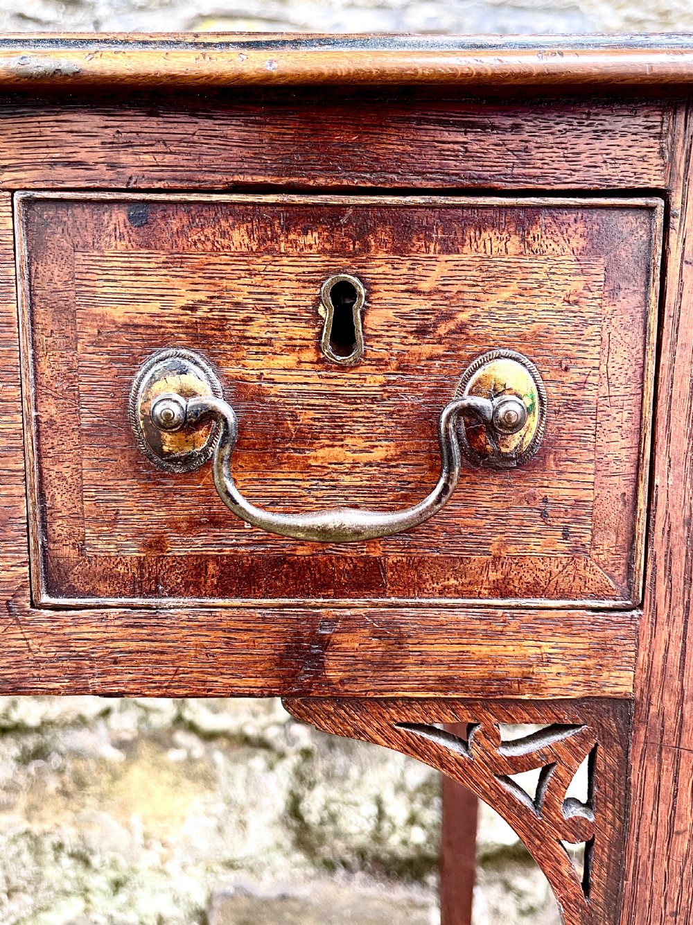A George III oak lowboy View V