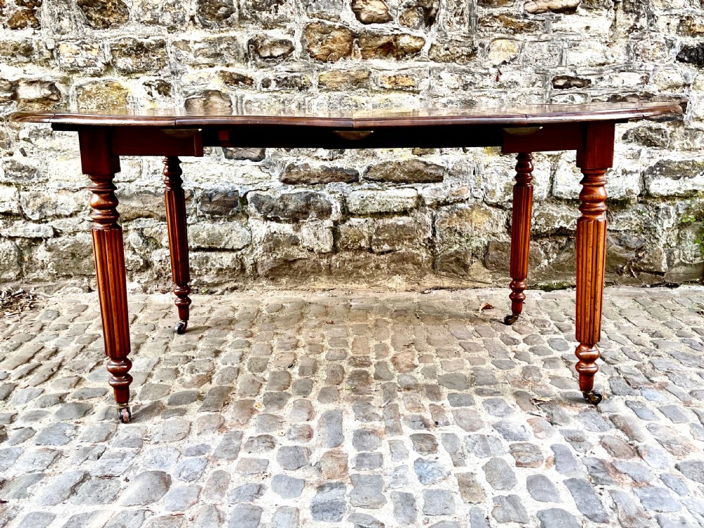 A William IV Mahogany Small Extending Dining Table View II