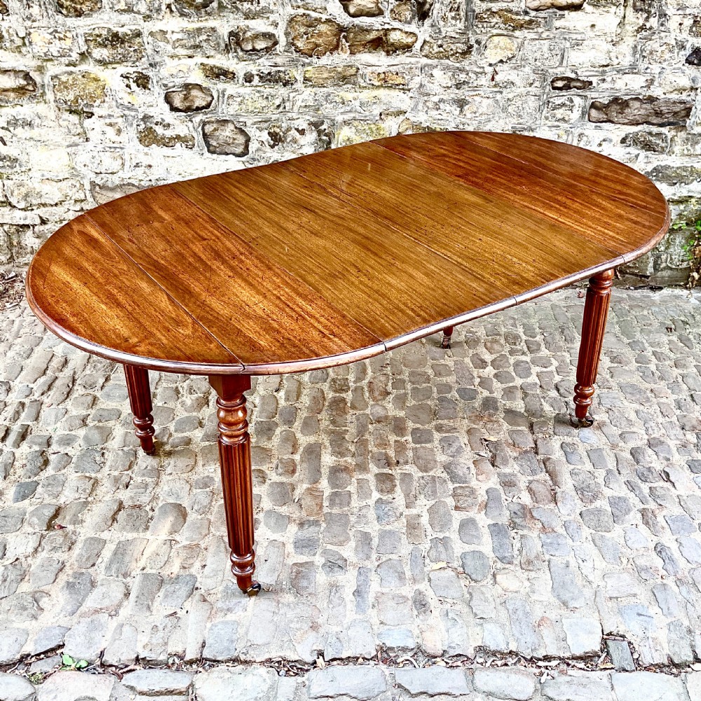 A William IV Mahogany Small Extending Dining Table View IV