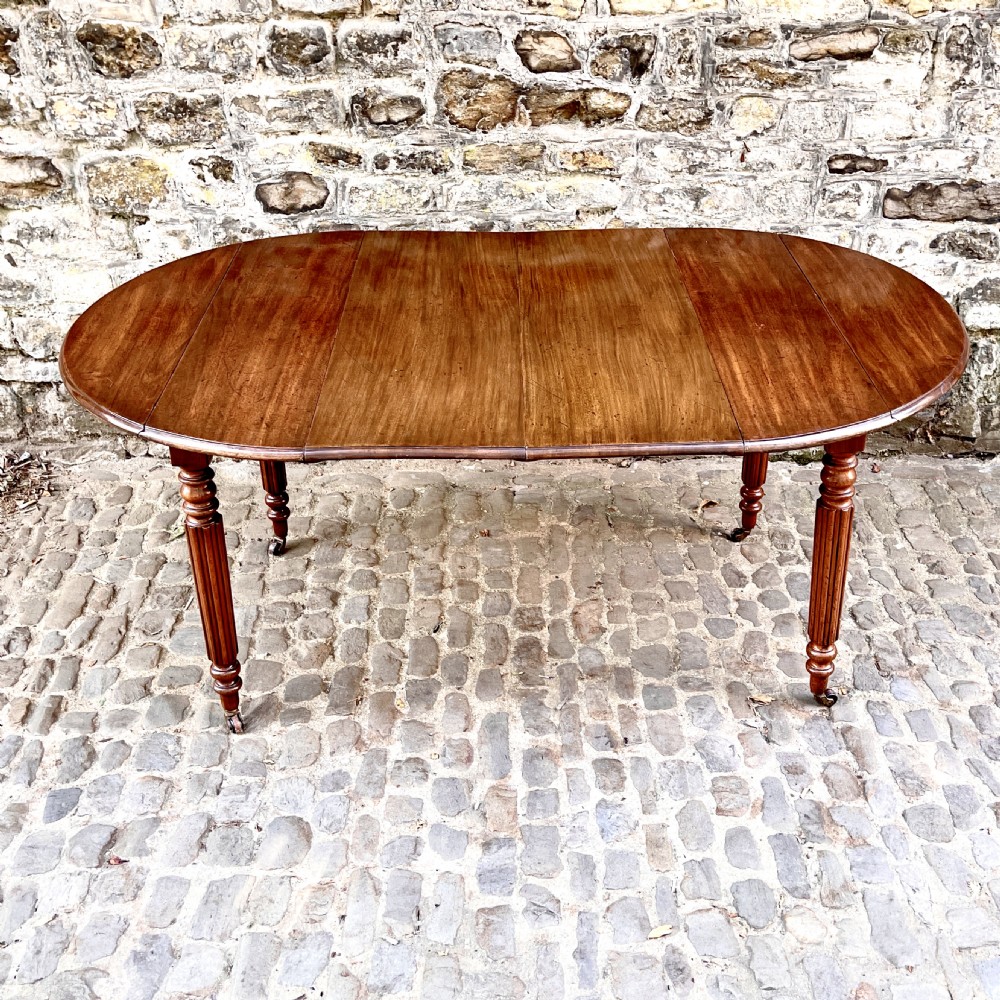 A William IV Mahogany Small Extending Dining Table View V