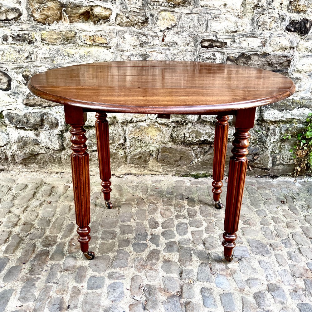 A William IV Mahogany Small Extending Dining Table View XI