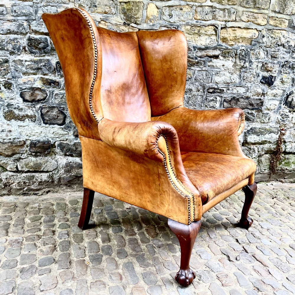 A Late Victorian Leather Wing Armchair View IV