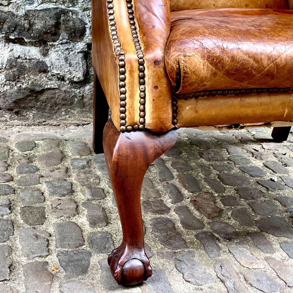 A Late Victorian Leather Wing Armchair View VI