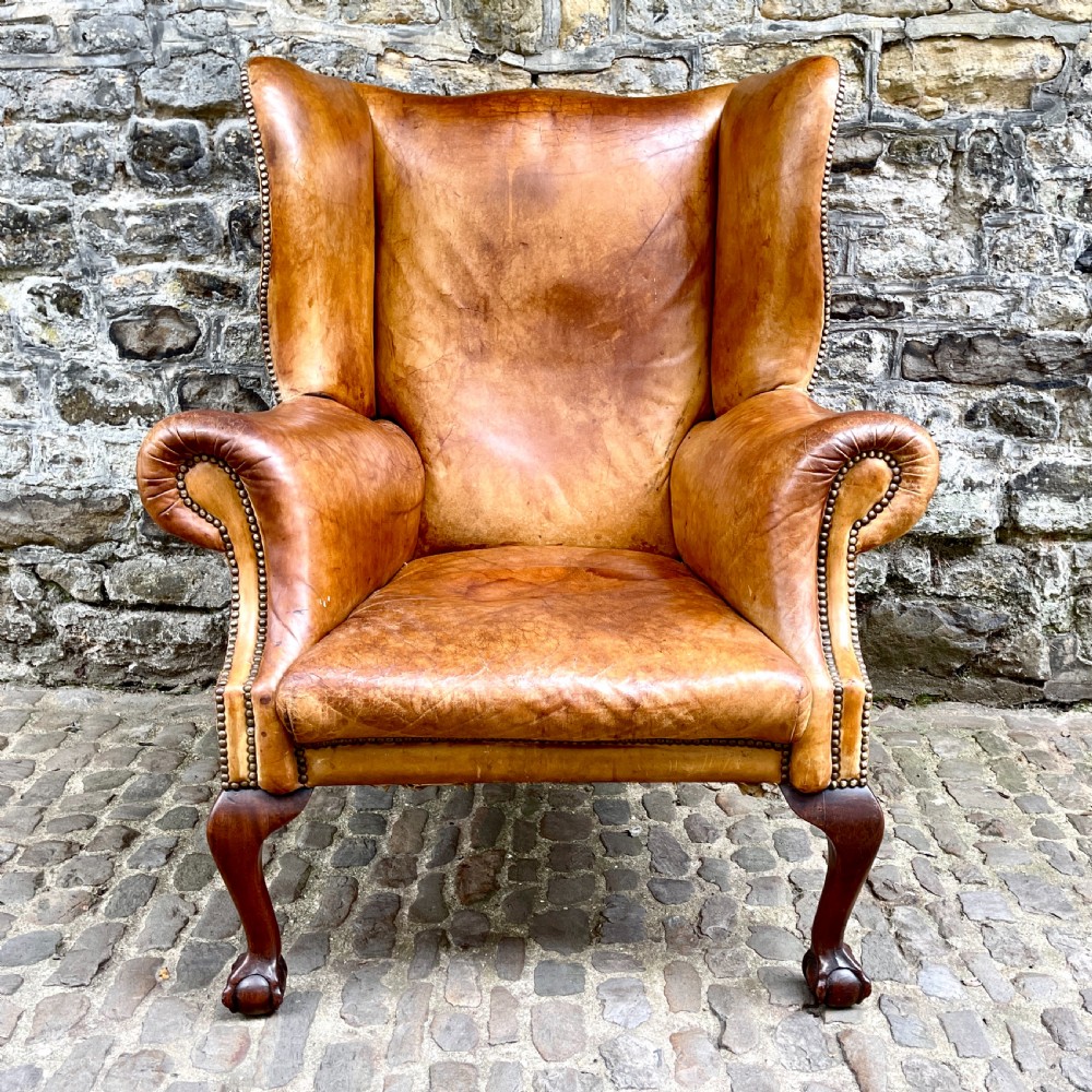 A Late Victorian Leather Wing Armchair View VIII