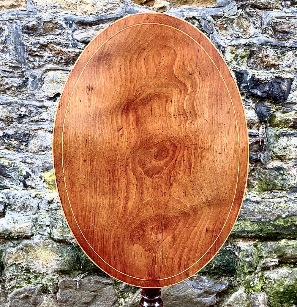 A George III mahogany tilt-top wine table  View III