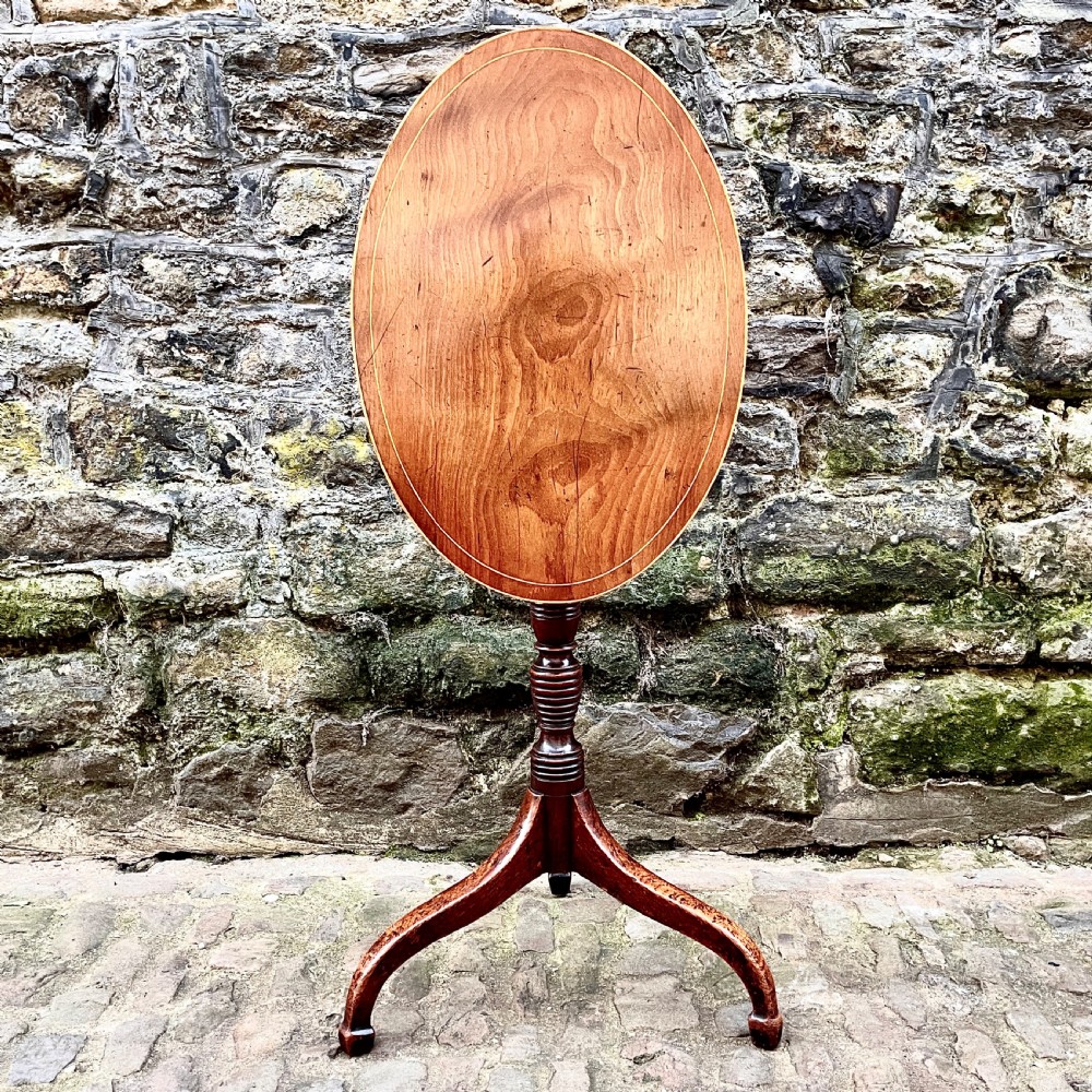 A George III mahogany tilt-top wine table  View IV