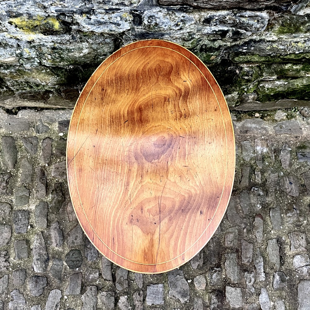 A George III mahogany tilt-top wine table  View V