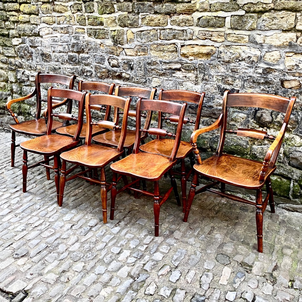 A set of eight mid Victorian kitchen chairs