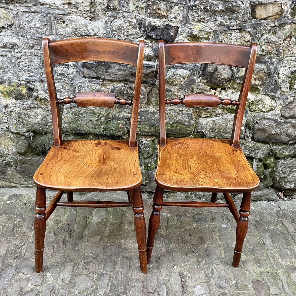 A set of eight mid Victorian kitchen chairs View VI