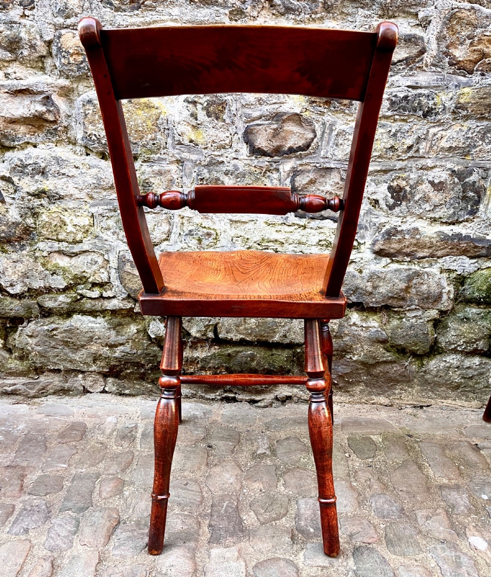 A set of eight mid Victorian kitchen chairs View X