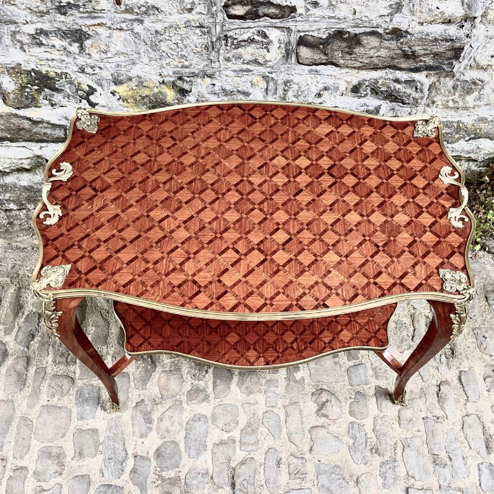 A late 19th Century French Kingwood Two Tier Table View V