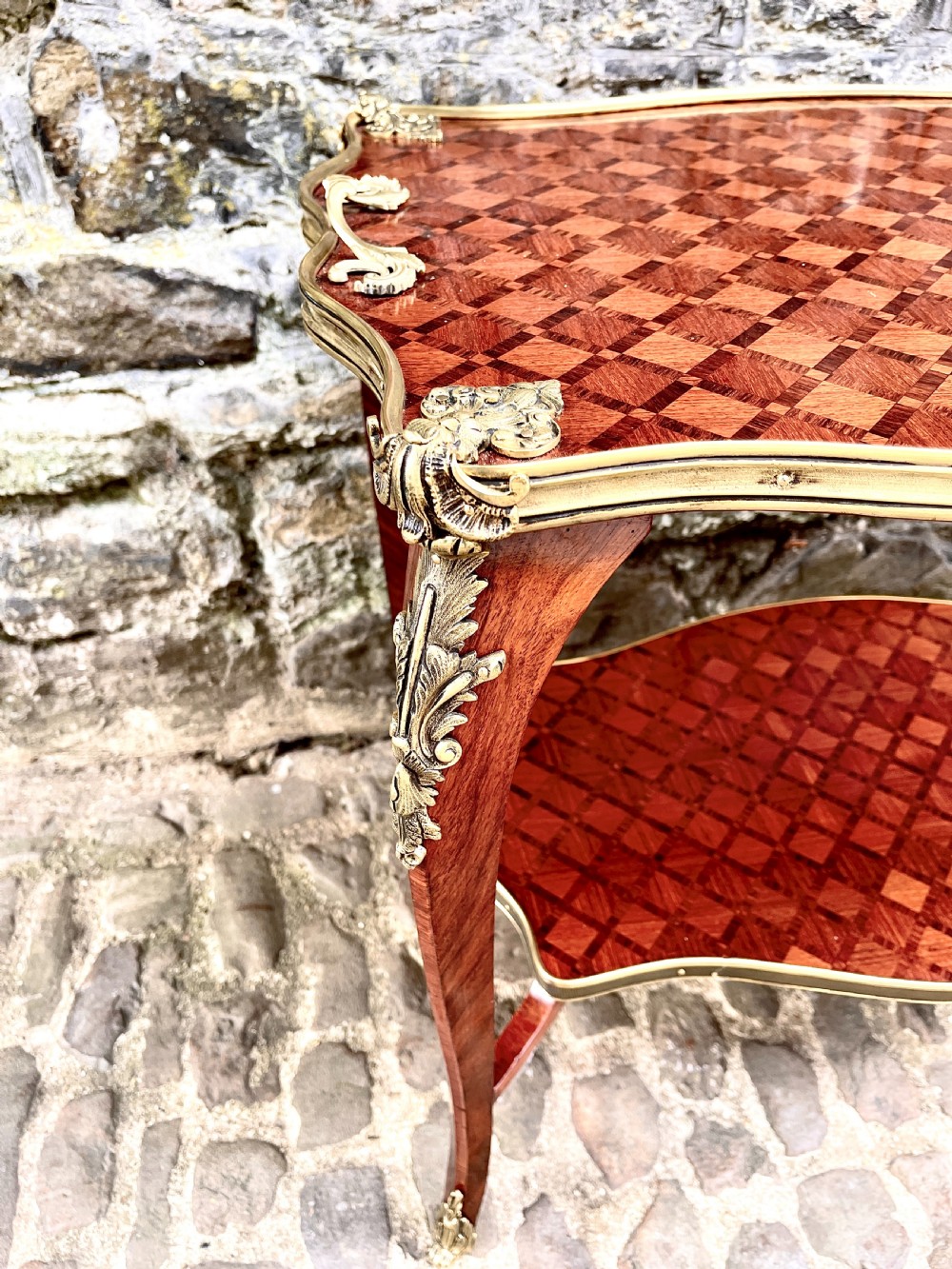 A late 19th Century French Kingwood Two Tier Table View VI