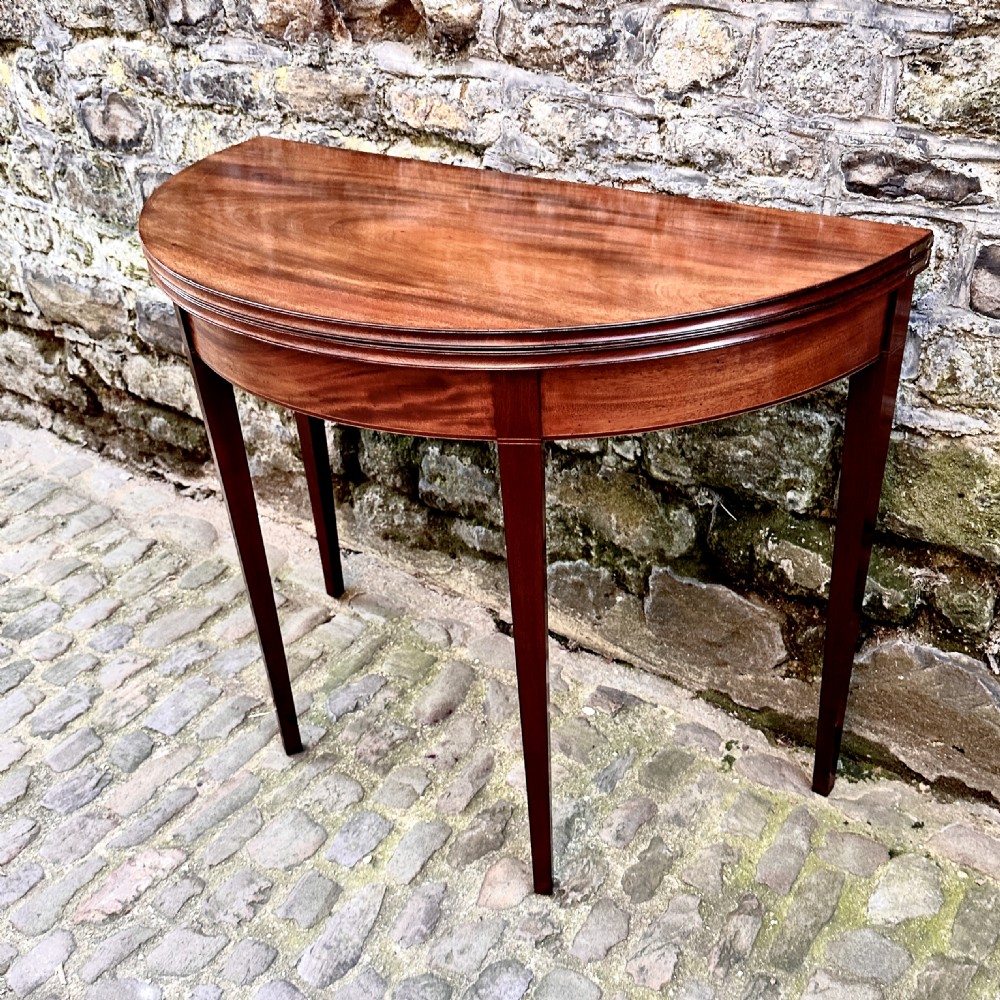 A George III Mahogany Demilune Tea Table View III