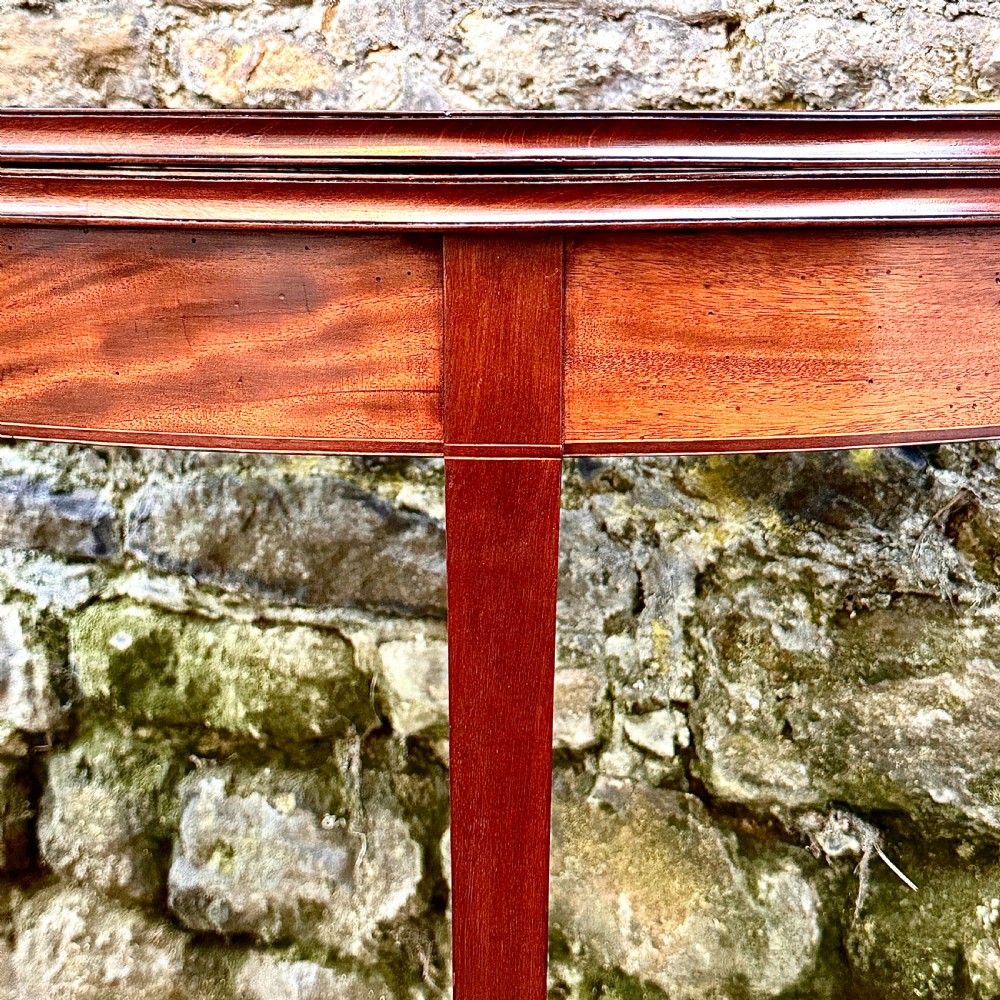A George III Mahogany Demilune Tea Table View IV
