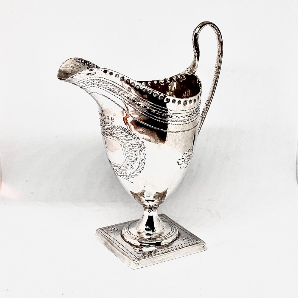 A George III Silver Helmet Cream Jug