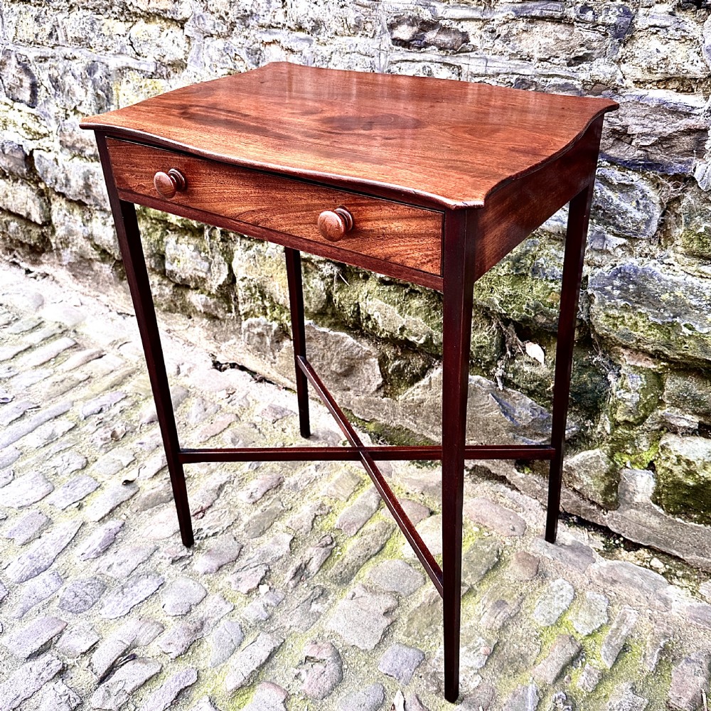 A George III Mahogany Serpentine Lamp Table View III