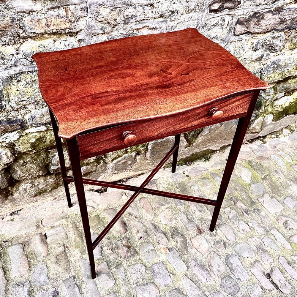 A George III Mahogany Serpentine Lamp Table View V