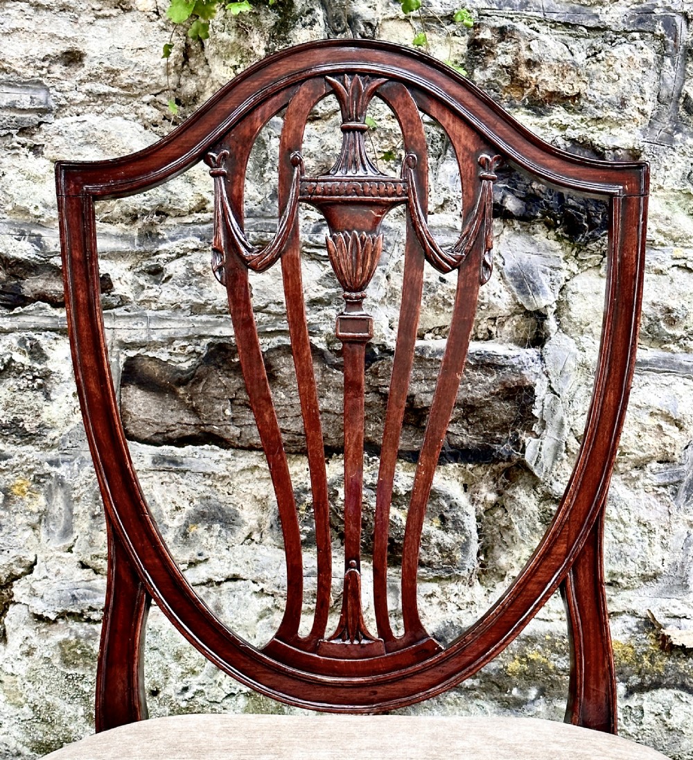 A Set of Four George III Shield Back Dining Chairs View IV