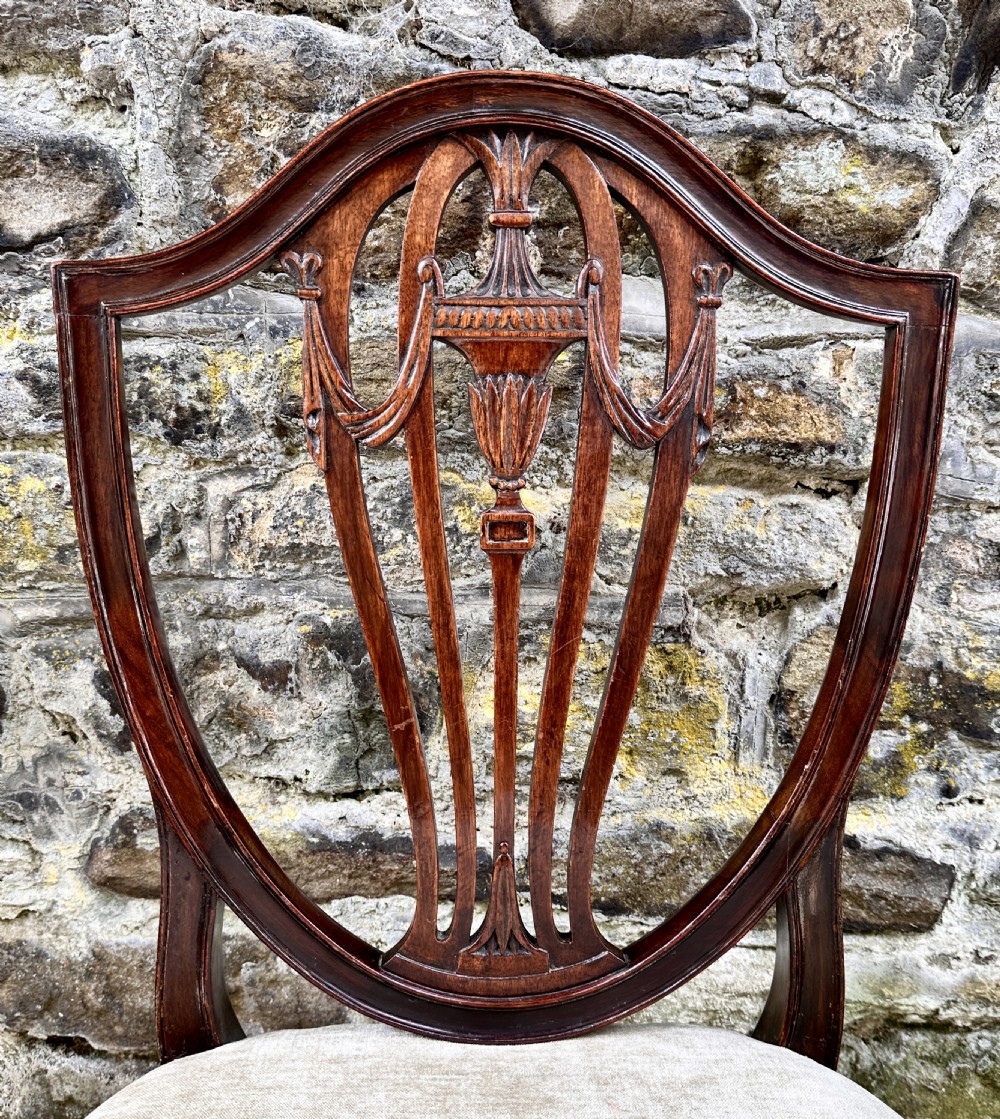 A Set of Four George III Shield Back Dining Chairs View IX