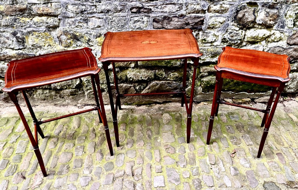 A Late Victorian Mahogany Nest of Three Tables View III