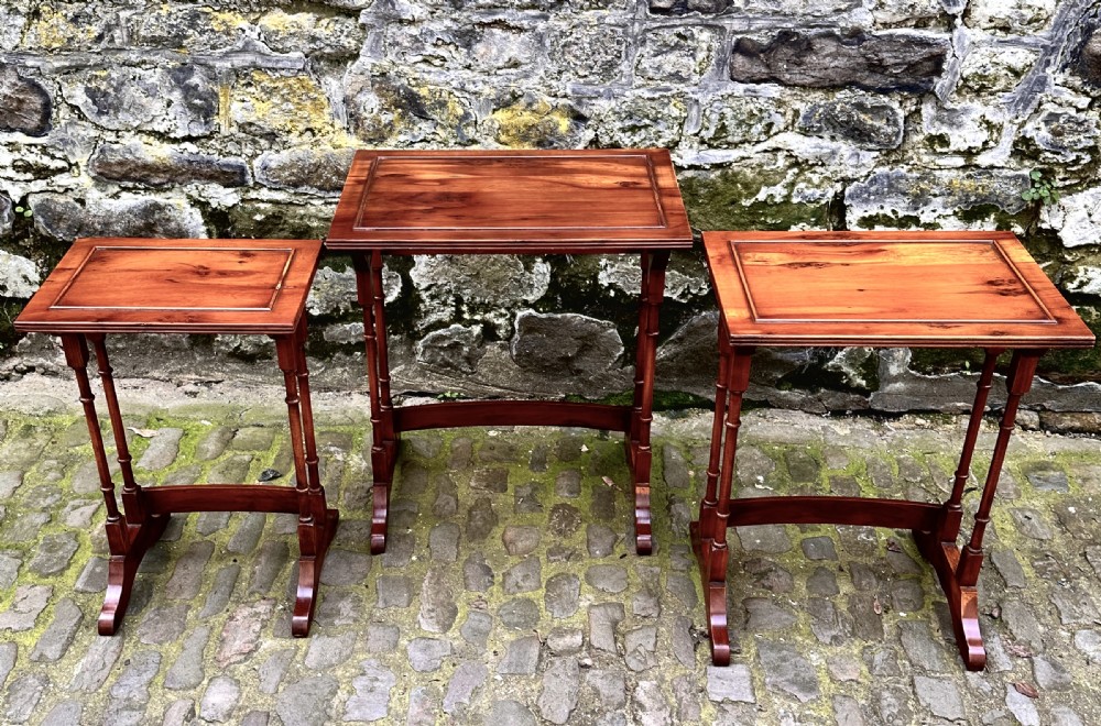 An Edwardian Nest of Three Yew Wood Tables View V