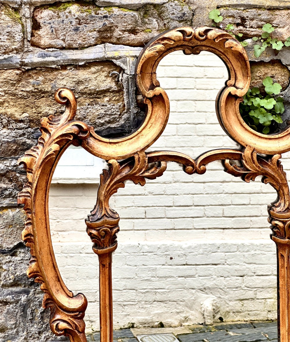 A Mid 19th Century Italian Giltwood Overmantel Mirror View II