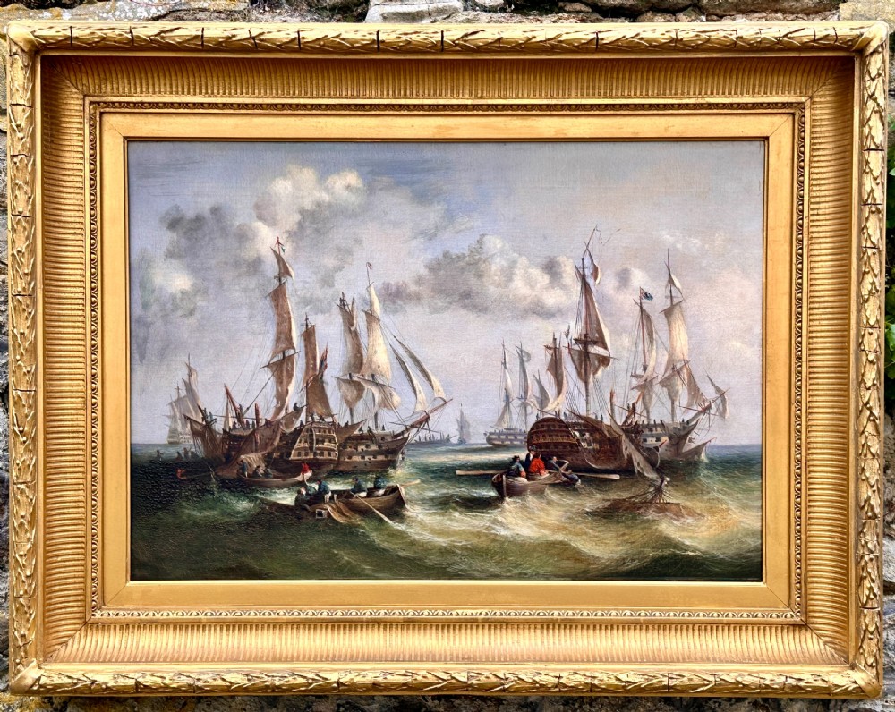 An early 19th-century marine oil painting featuring tall sailing ships in choppy seas after a battle, enclosed in an ornate gilded frame. View II