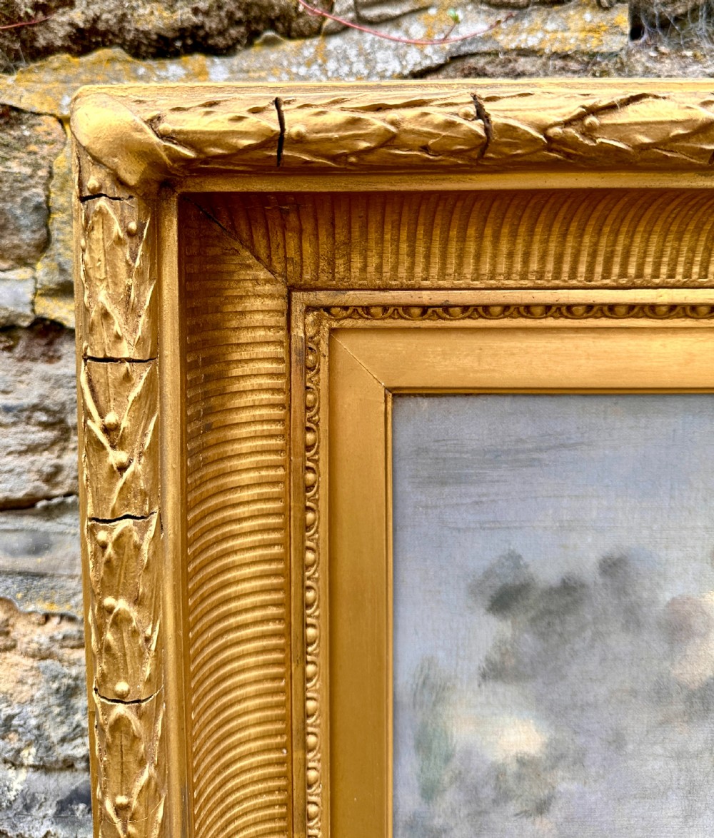 An early 19th-century marine oil painting featuring tall sailing ships in choppy seas after a battle, enclosed in an ornate gilded frame. View VII