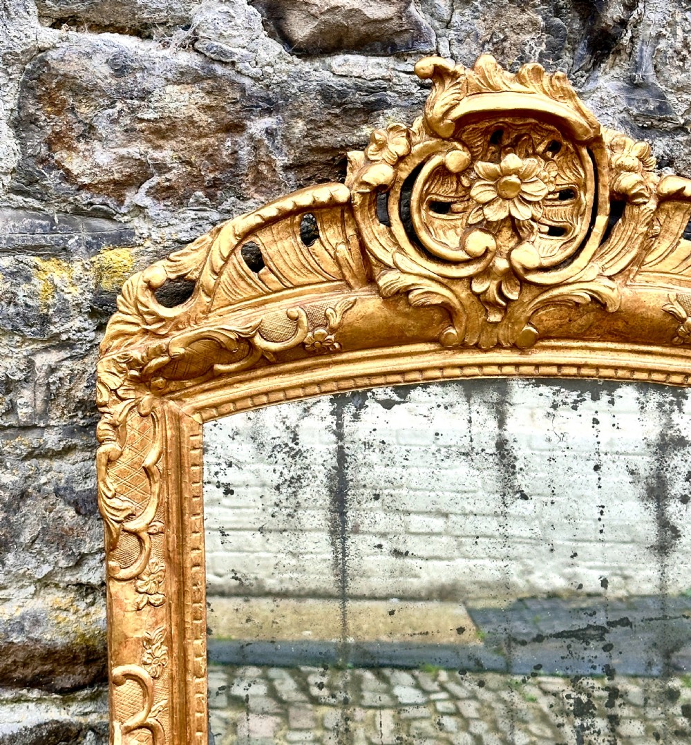 An 18th Century Italian Giltwood Overmantel Mirror  View III