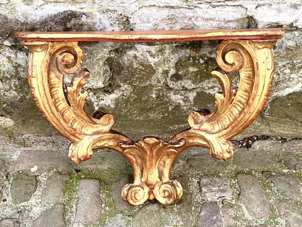 A Pair of 18th Century Italian Giltwood Console Tables View II
