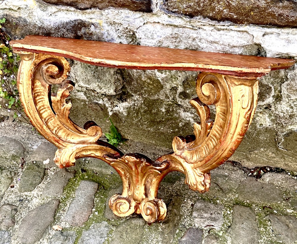 A Pair of 18th Century Italian Giltwood Console Tables View III
