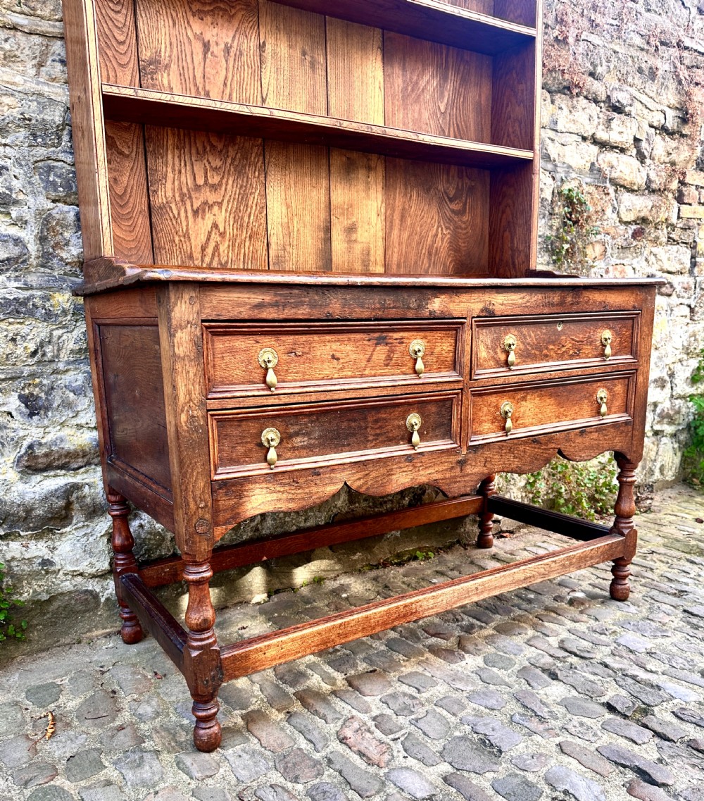 A George III Oak and Chestnut Dresser View V