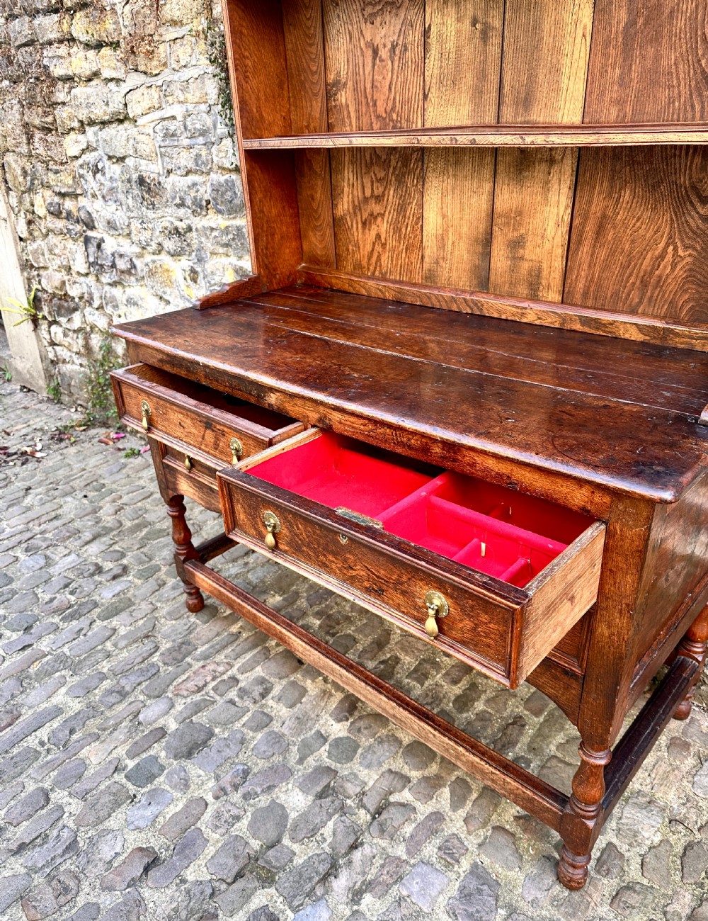 A George III Oak and Chestnut Dresser View VI