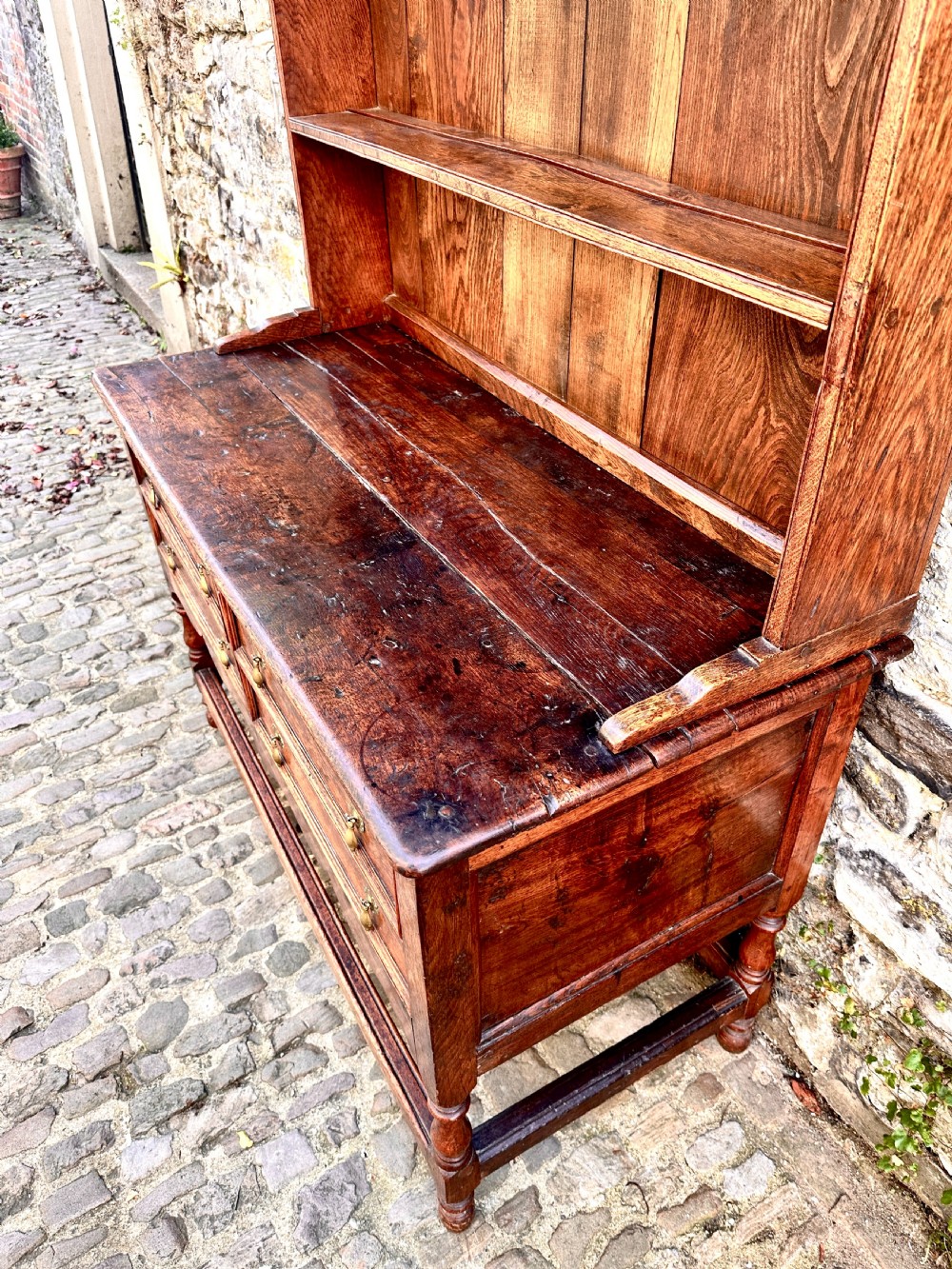 A George III Oak and Chestnut Dresser View VII