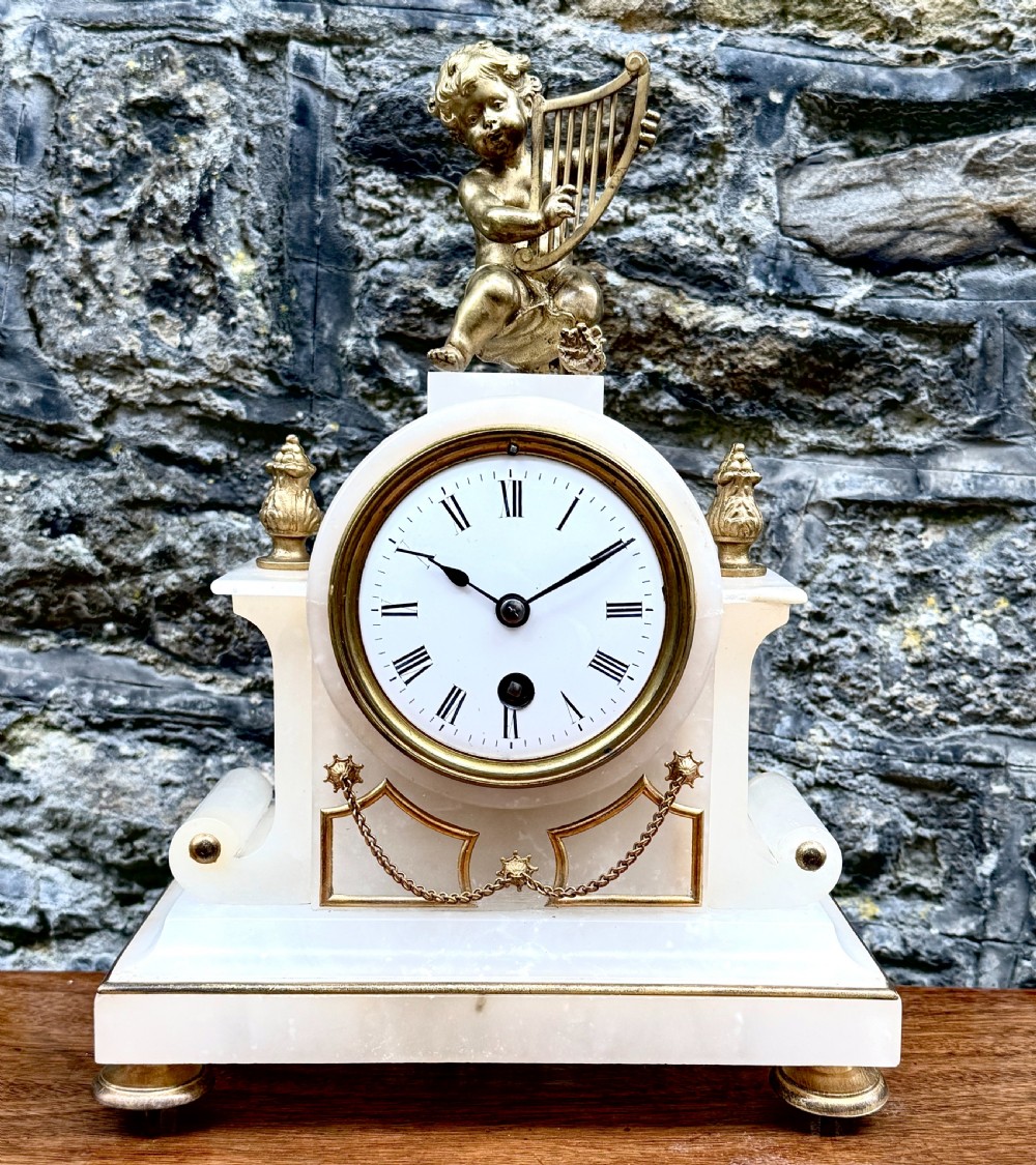 A Late 19th Century French Alabaster Mantel Clock