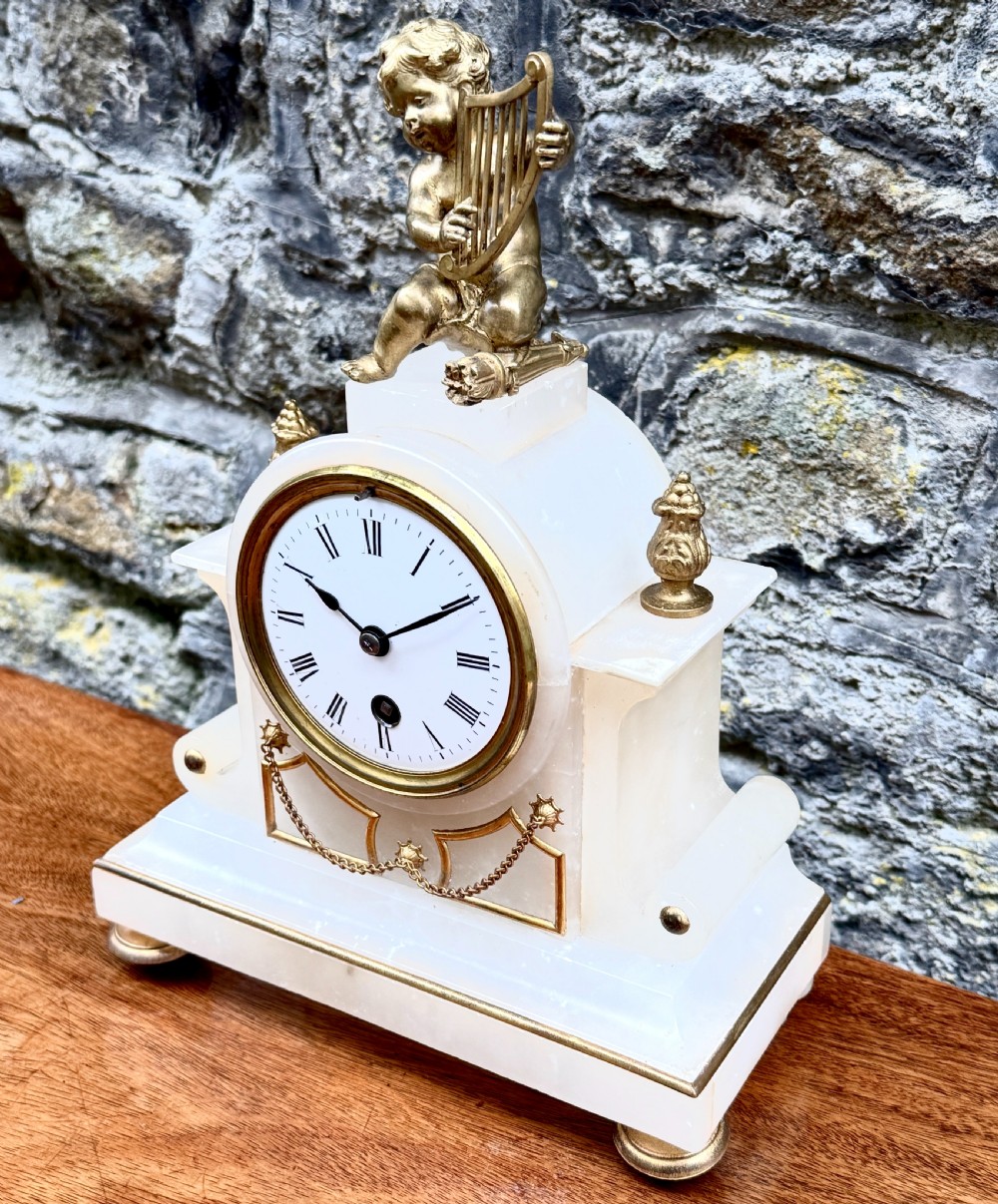 A Late 19th Century French Alabaster Mantel Clock View II
