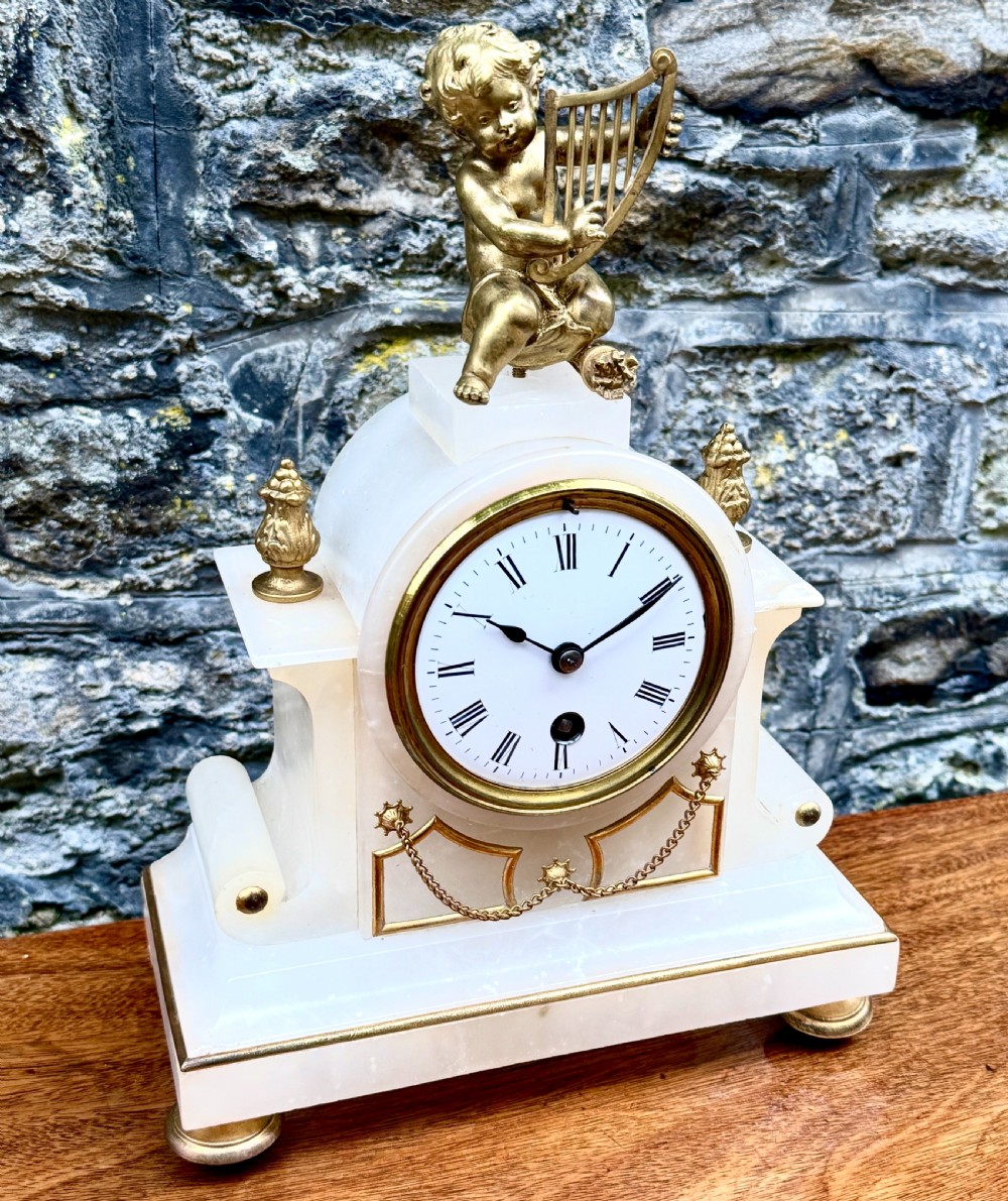 A Late 19th Century French Alabaster Mantel Clock View III