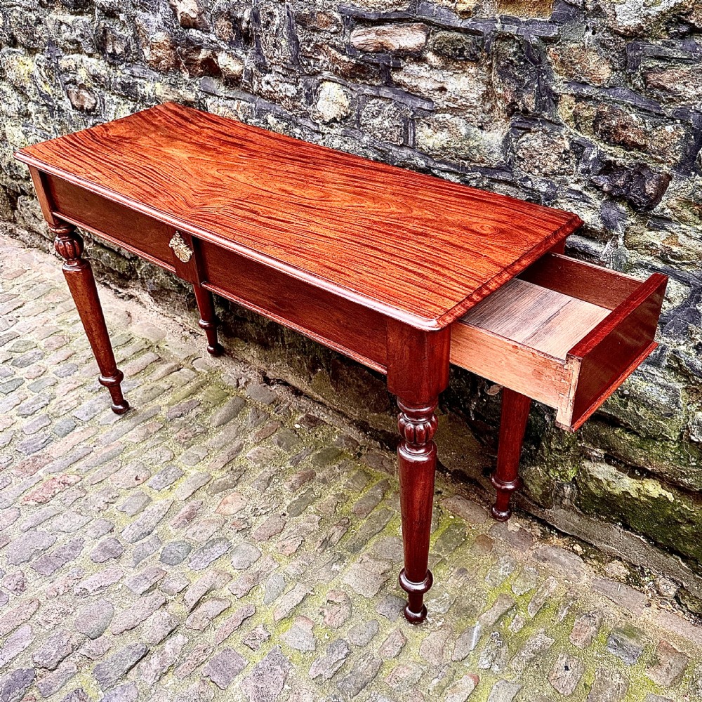 An Early Victorian Mahogany Console Table View V