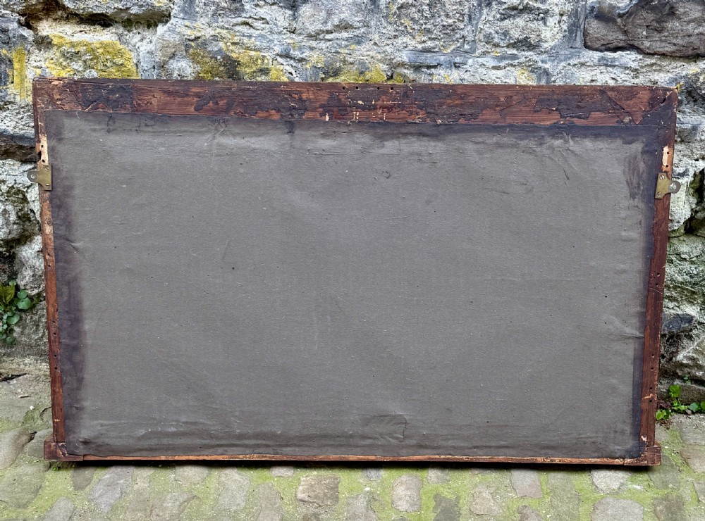 A rectangular early 19th-century Regency overmantel mirror framed in figured burl wood veneer with an inner gilt slip border and corner plinth feet. View IV