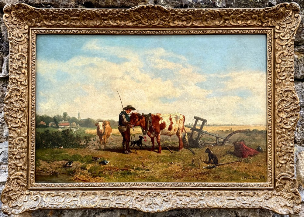 A 19th-century oil painting on canvas depicting a farmer tending to harnessed cattle in a open pastoral field, framed in ornate gilded wood.