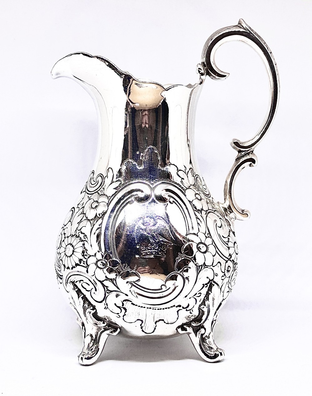 A Mid Victorian Silver Jug